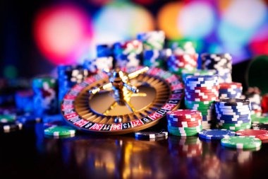 Ganesha Gold game interface showing five reels, paytable, and spin controls